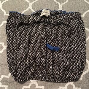 Black and White Patterned Skirt with Blue Accents